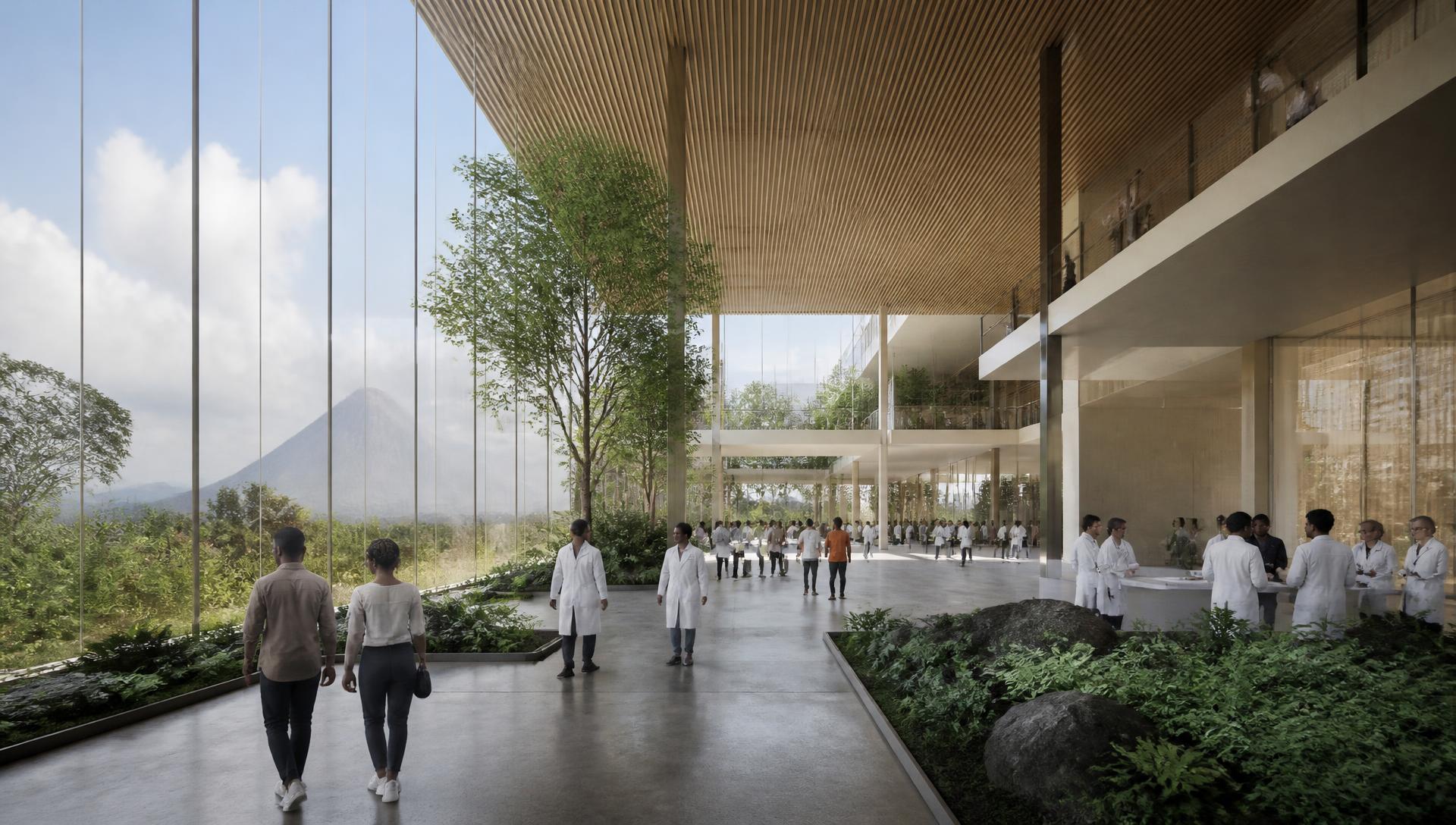 Double-height visitor centre atrium with timber ceiling and volcanic landscape beyond